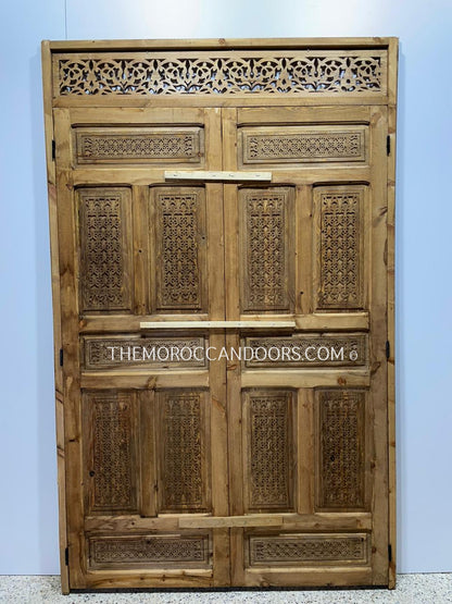 Traditional Moroccan door with precision-carved details