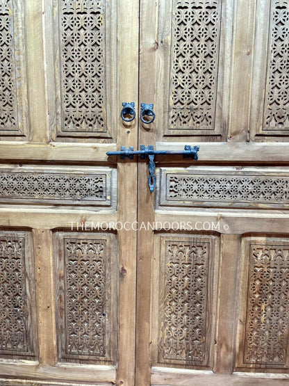 Intricately designed wooden door with a Moroccan touch