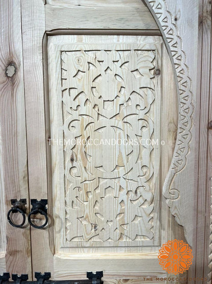  A Legacy of Protection: Hand-carved double wooden doors, a testament to enduring craftsmanship, safeguard your home for generations to come. 