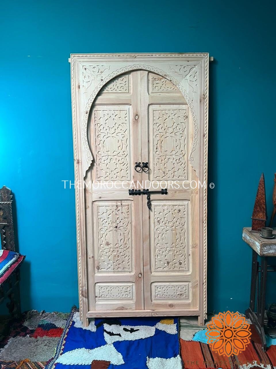 Welcome in Style: Hand-carved double wooden doors, the perfect first impression that welcomes guests into a world of timeless elegance and artistry.