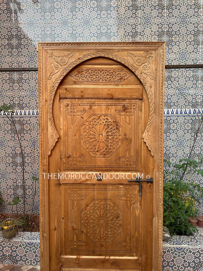 Add a Touch of Exoticism to Your Home with Hand Carved Wooden Custom Doors