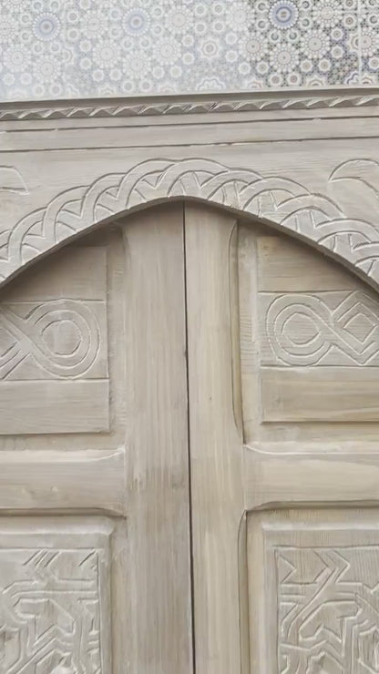 Elegance and Moroccan craftsmanship combine in this custom hand-carved door with white Color, bringing the magic of Morocco into your home.