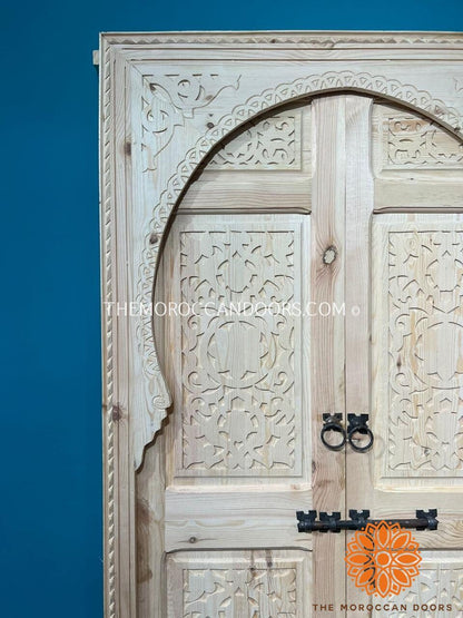 A Statement Piece for Your Home: Hand-carved double wooden doors, a symbol of refined elegance that sets your home apart from the ordinary.