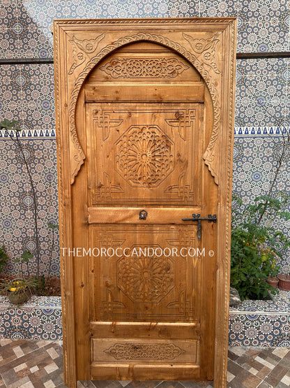 Handcrafted Wooden Door for Elegant Entryway: Elevate your home's curb appeal with a handcrafted wooden door, meticulously crafted from sustainable hardwood for timeless beauty and lasting durability.